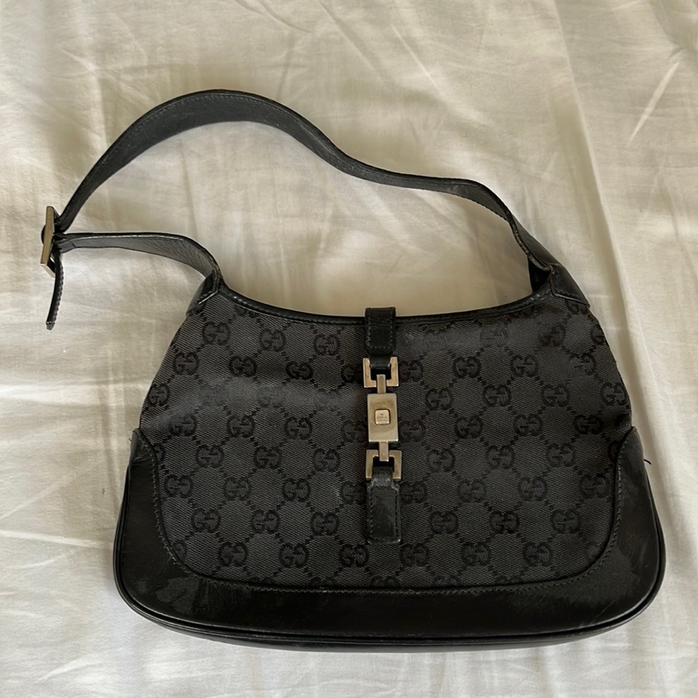 Black Gucci shoulder bag with silver hardware